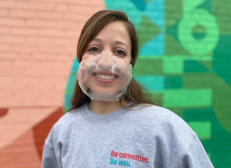 Jaclyn Abramson, a Master of Public Health student, models a TransparenSee mask