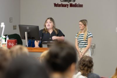 (From left) Gracie Akers and Hannah Howell presenting on “Dining with Dignity: A Guide for Restaurant Staff to Support Guests with Memory Issues” after working with Warm Hearth Village for the MPH Integrated Learning Experience presentations