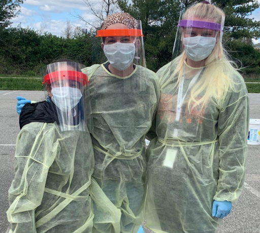 Master of Public Health students Jaclyn Abramson, Teace Markwalter, and Hannah Reed at a COVID-19 testing site